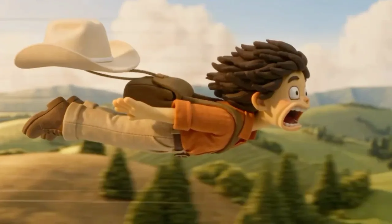 Mono-kun flying over green hills, his hat blowing away